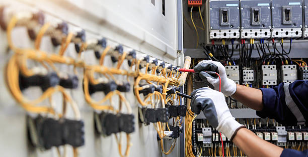 Professional Electrician technician working in Bally, PA